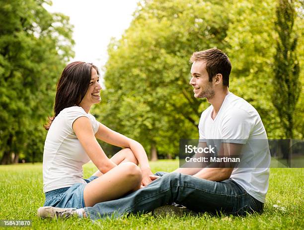 Young Couple Talking Outdoor Stock Photo - Download Image Now - Adult, Beautiful People, Beautiful Woman