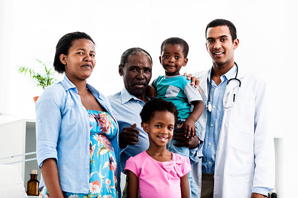 istock Three generation family at doctor 158432392