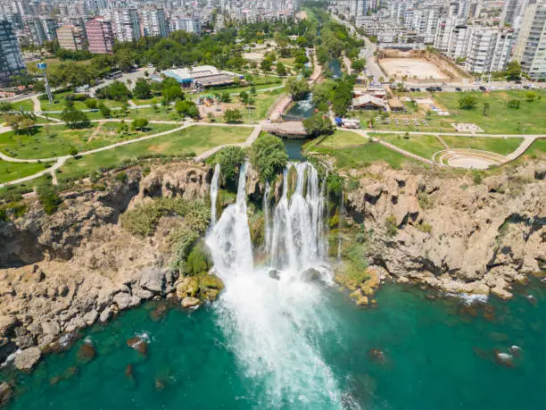 Photo of Aerial view of Duden waterfall dropping in Mediterranean Sea.