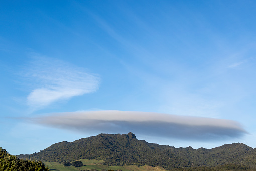 Raglan's iconic Mount Kariori with a lenticular cloud capping it.