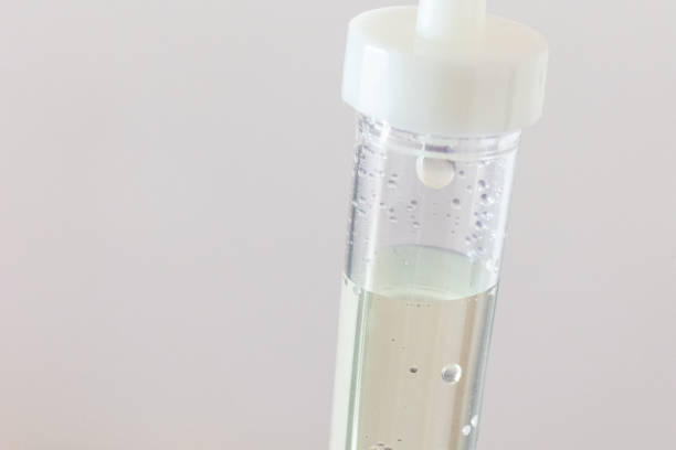 istock Close-up of an IV drip against a white background. 1584408322