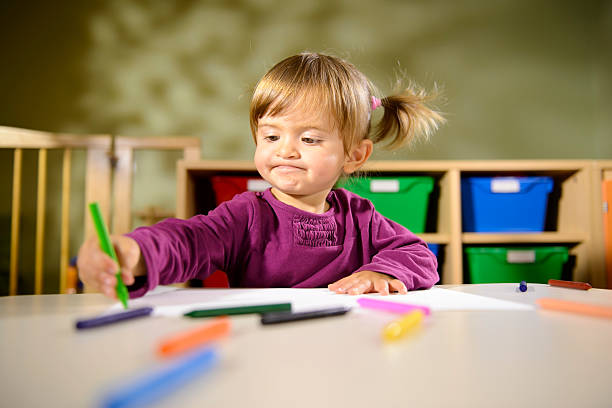 istock Babies and fun, child drawing at school 158441359