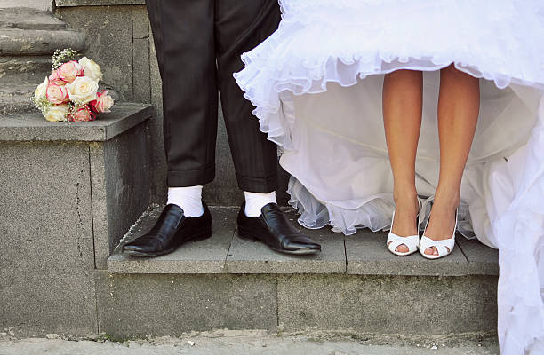 istock Bride and groom's feet 158441662