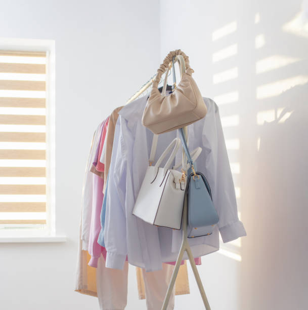 istock female  summer wardrobe in  white room 1584431635