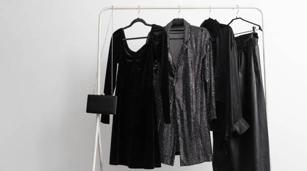 istock elegant black evening wear on a hanger 1584431645
