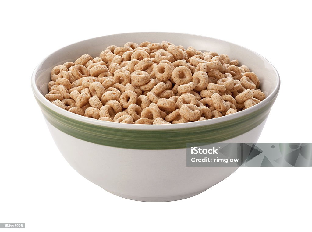 Oat Cereal Isolated with clipping path  Round Oat Cereal in a white ceramic bowl with a green stripe.  Sometimes this cereal is marketed under the name Cheerios.  The  cereal is shown  angle, and is in full focus from the front to the back.  The image is isolated on a white background, and includes a clipping path. Breakfast Cereal Stock Photo