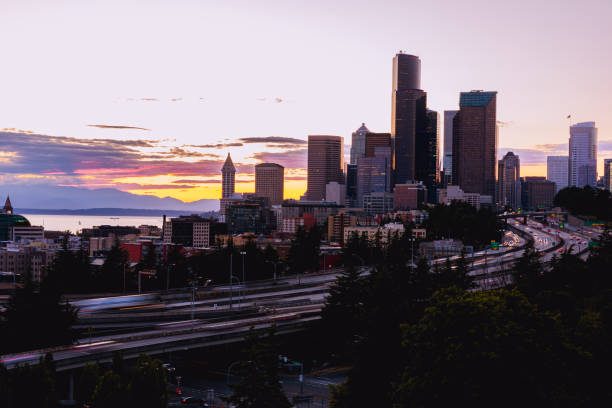 istock Downtown Seattle Washington City skylines and Interstate freeways converge at sunset 1584517228