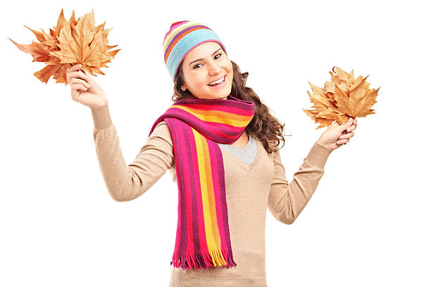 istock Young female holding tree leaves in her hands 158452062