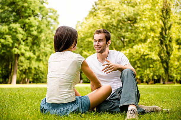 istock Young couple talking outdoor 158452073