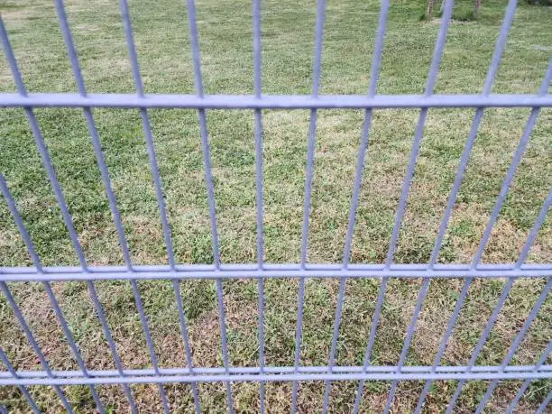 Photo of wire mesh fence is commonly used to block the area The territory is simple, easy to set up and strong.