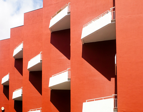 Red concrete framed apartments block. Ourense city, Galicia, Spain