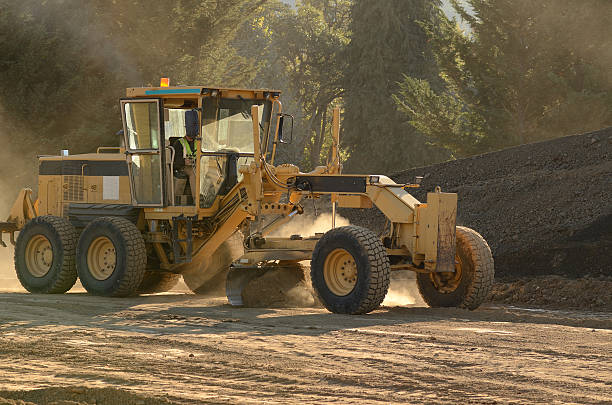 road nivelador - construction machinery machine industrial equipment grader - fotografias e filmes do acervo