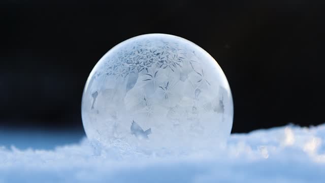 soap bubble freezing to ice in real time
