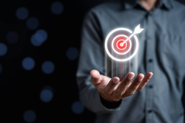 istock Businessman hold virtual target icon and planning development leadership and customer target group management in corporate growth business. 1584596913