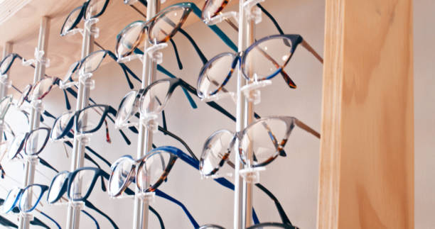 Glasses, eye care and optometry store or shelf with optical, frame and lens choice on display. Specs, eyeglasses and optics retail shop or ophthalmology clinic for eyesight, vision and health