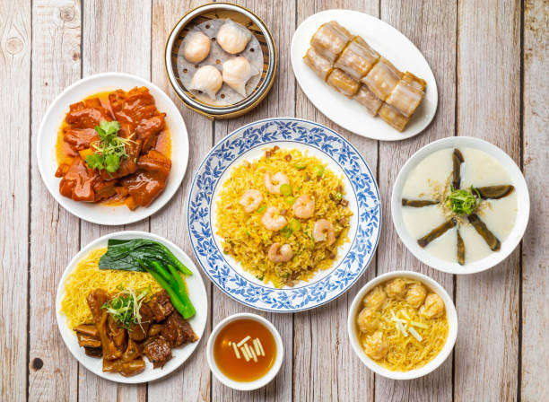 istock salted lean pork and preserved egg congee, rice noodle rolls filled with twisted cruller, shrimp fried rice, steam shrimp dumplings, pig feet beancurd, wonton noodles soup isolated hong kong food 1584637105