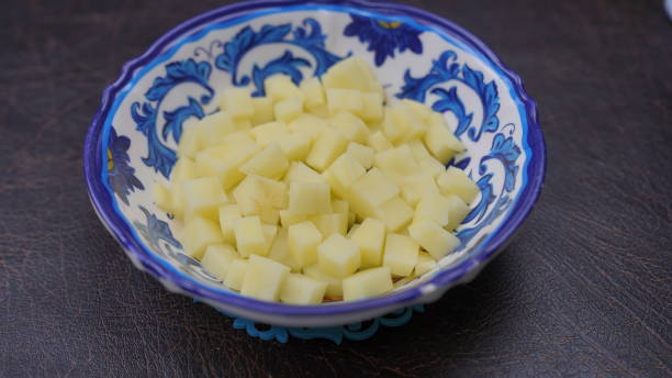 Chopped potato in a bowl close-up Chopped potato in a bowl close-up cabbage coral photos stock pictures, royalty-free photos & images