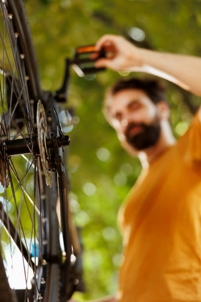 istock Bike components being serviced outside 1584684465