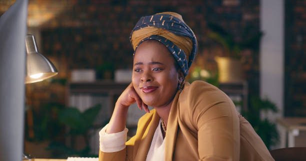 istock Night, office computer and sad black woman reading journalism story, check email communication or blog post. Mental health, depression and African business person crying over news article mistake 1584686705