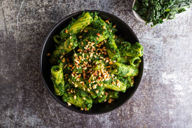 istock Pasta with black cabbage pesto and chopped hazelnuts 1584714775