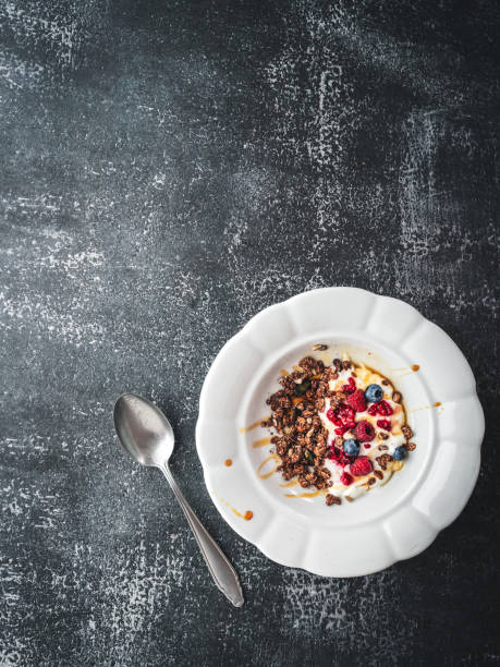 istock A breakfast bowl with granola, yoghurt and berries 1584716482