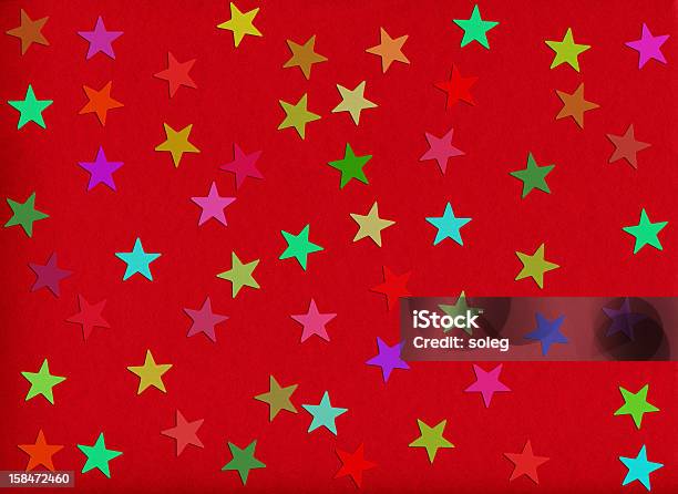 Holiday Background Estrellas En Forma De Confeti En Rojo Foto de stock y más banco de imágenes de Abstracto