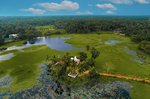 Aerial view of the Lunuwila temple in the middle of the Lunuwila lake near Wenappuwa, Sri lanka