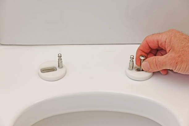 istock Fixtures for new toilet seat 1584748878