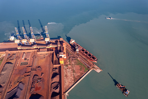 Aerial view of mineral freight port on a sunny day