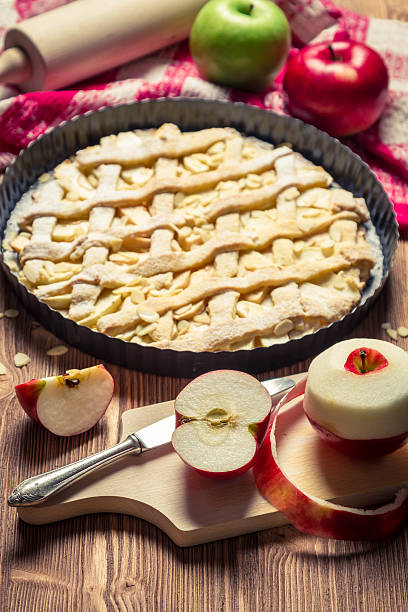 istock Apple pie with fresh fruits on old table 158475241