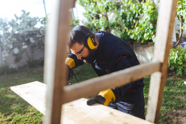 istock Adult man who manually processed planks 1584785765