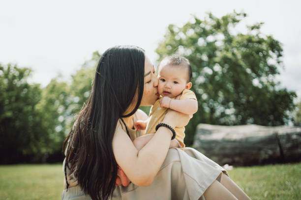 istock Mother And Son Enjoy Time in Nature 1584842941