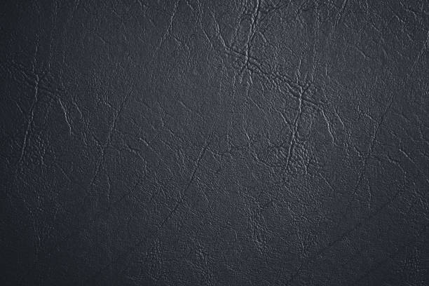 istock Close up of black leather texture can be use as background 1584868104