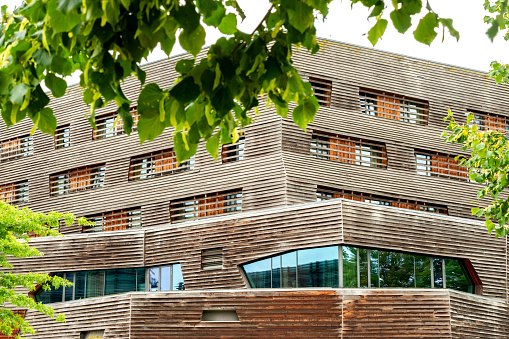 Building of the Raphael Hotel Waelderhaus in Hamburg, a sustainable structure built from wood, located on the Elbinsel Wilhelmsburg.