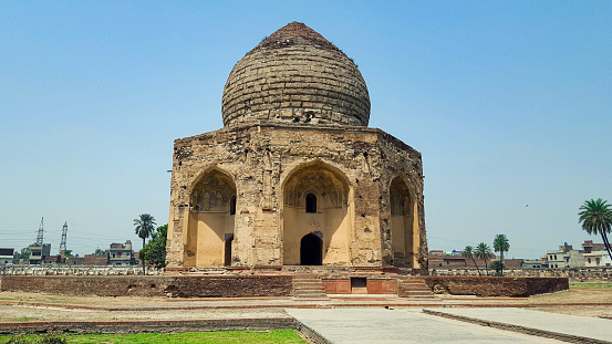 Tomb of Asif Khan - May, 05, 2018: Lahore, Pakistan. Asif Jah was brother of Nur Jahan and brother-in-law to  Mughal Emperor Jahangir. It was looted of its all Jems and diamonds by Ranjit Singh army.