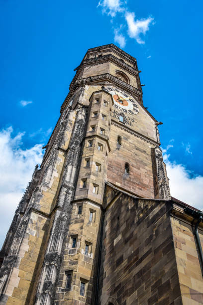 Low Angle View Of Stiftskirche Clocktower In Stuttgart, Germany