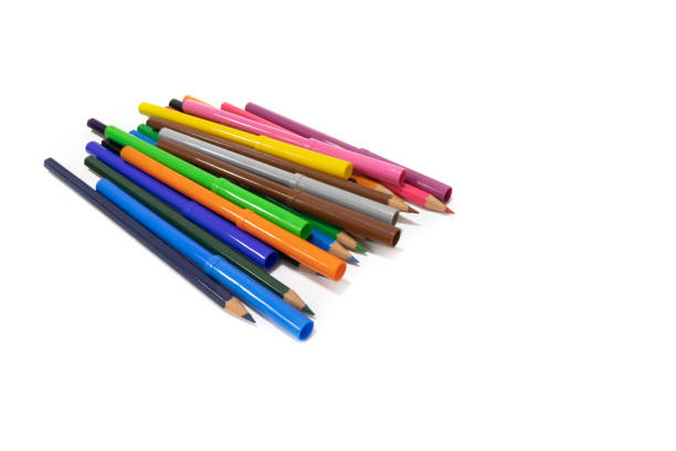 istock A bunch of felt-tip pens and colored pencils isolated on a white background. 1584961214