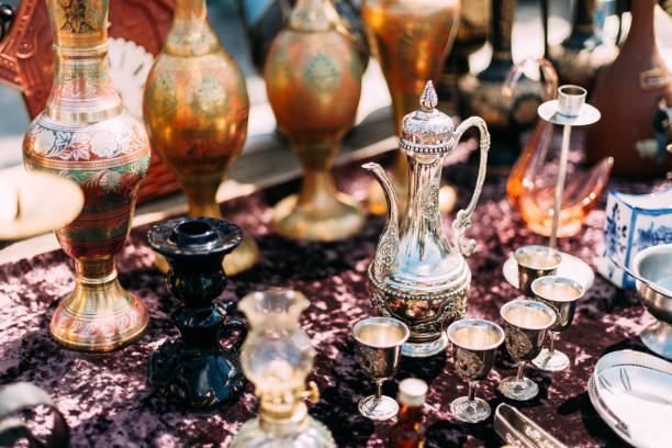 istock Metal Oriental Jug With Engraved Texture Floral Pattern. Oriental Style Ancient Jug At Flea Market. East Tableware. Old Tableware For Cofe And Tea 1584962780