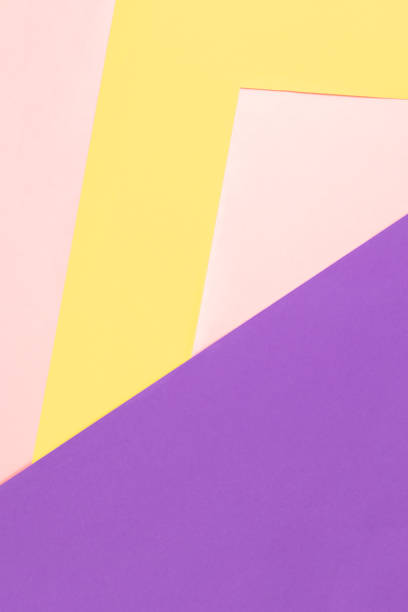 istock Yellow and Purple Paper Background 1584996762