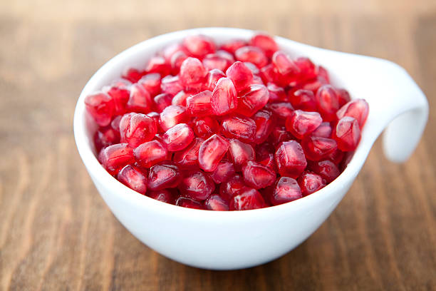 istock Cup of pomegranate seeds. 158499707