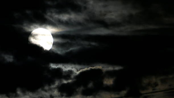 istock The full moon and clouds on a stormy night. Bavaria, Germany. 1585038454