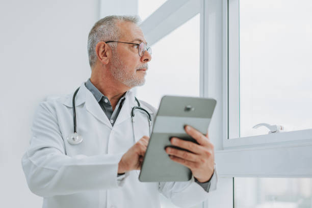 istock Portrait of a doctor using digital tablet 1585067164