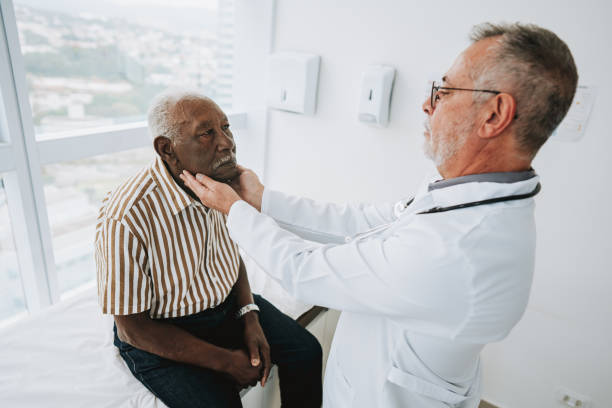 istock Patient with sore throat 1585069826