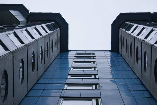 istock Low angle view of a blue building 1585088283