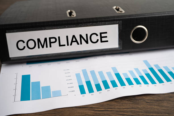 istock Compliance. Binder data finance report business with graph analysis in office. 1585096014