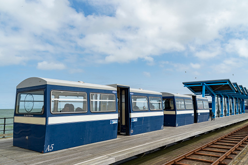 Railway on the pier in Southend, England, UK.  Southend has the longest entertainment pier in the world. The waiting areas are old railway carriages.