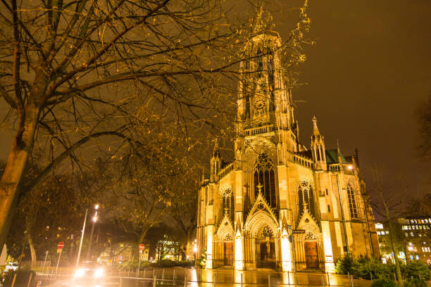 istock Lighted up St. John's Church in Stuttgart, Germany 1585105269