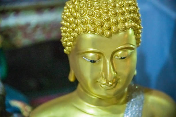 istock Head of a buddha statue 1585114982