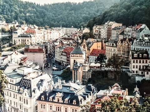 Karlovy Vary or Karlsbad was founded and named after emperor Charles IV and is famous for its spa culture. Thousands of the rich and famous visited the medical spas over the centuries. You can also drink the mineral water, it is rich in salt and sulfur  and it helps with digestive problems. Besides all that it is a beautiful city with great architecture in its centre. On a walk in the mountainous environment I took this beautiful picture. The city is a part of  UNESCO world heritage because of the spa culture.