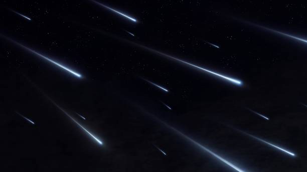 istock Bright stream of meteors. Falling stars on a black background. 1585163514